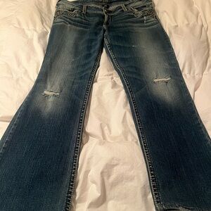 Silver Jeans Distressed Blue Flare Jeans